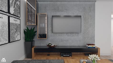 Salon z betonową ścianą RTV