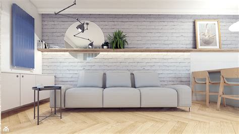 Salon z dominującą ścianą z białej cegły Oxford
