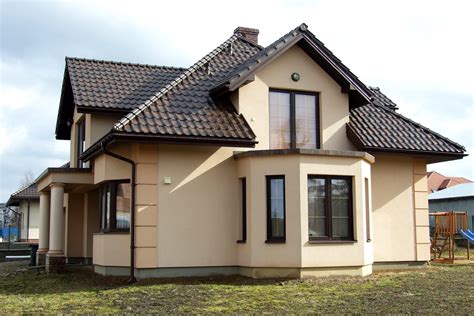 Przykładowa elewacja w kolorach zieleni i beżu